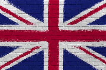 Fototapeta premium Flag of United Kingdom on Brick Wall. Artwork in grunge, urban and industrial style. British flag as graffiti graphic.