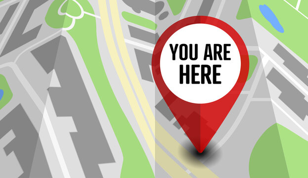 location marker with text YOU ARE HERE on folded map, vector illustration