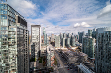 Toronto skyline gardener express way and  king st blue cloudy skies with condos and businesses 