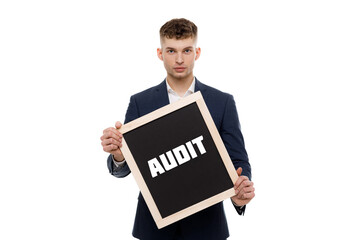 A businessman shows an inscription: AUDIT