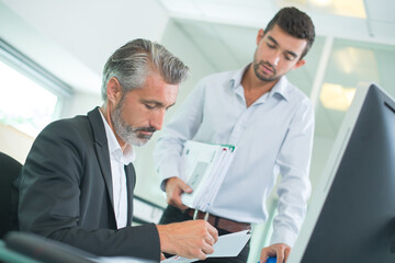 Fototapeta premium portrait of businessman checking papers