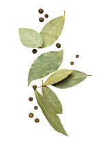 Bay leaf and allspice falling on a white background.