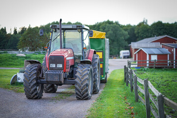 Tractor with a cattle trailer at the farm