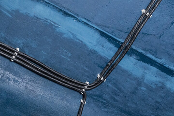 Industrial cable power connection and insulation of electrical wires installation of electricity line on the wall