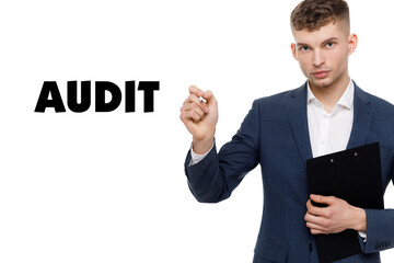 A businessman shows an inscription: AUDIT