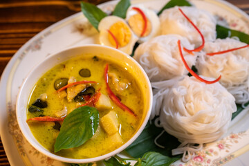 Thai style food, green curry with chicken, delicious vegetable Asian dinner