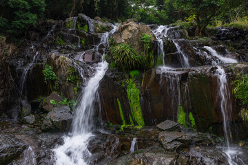 Fototapeta na wymiar Cascade waterfall river in tropical forest