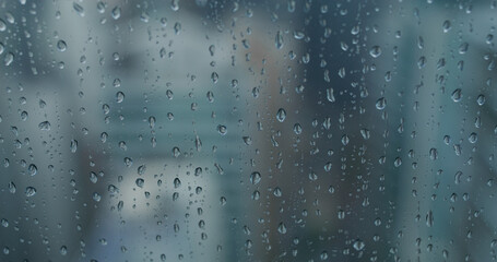 Raining on the window at bad weather