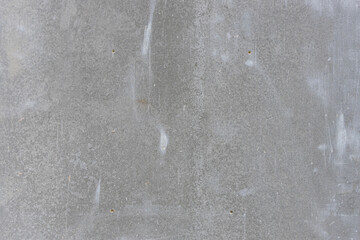 Gray concrete wall with streaks. Background texture