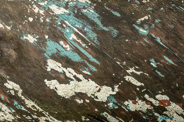Old paint from the wooden surface. Background texture