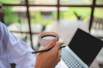 Asian business man person, freelance businessman working in co-working space or cafe