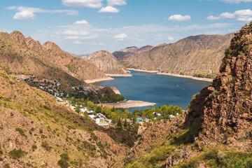 Fototapeta na wymiar Dam reservoir in the mountains.