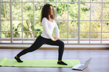Fototapeta premium African American woman person exercise with Yoga at home, sport healthy lifestyle at indoor fitness