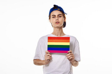 woman wearing white t-shirt lgbt flag inventor community