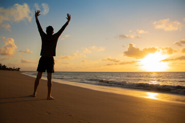 Fototapeta na wymiar Man Enjoying the Brazilian Sunset Beach 