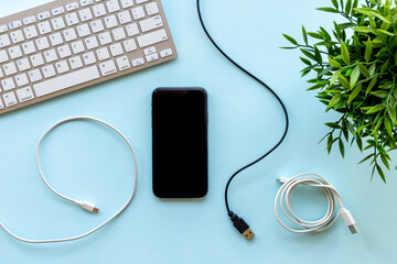 Usb cable for charging mobile phone and computer on office table