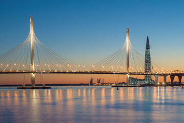 Cable-stayed bridge over the Petrovsky fairway in the May twilight, Saint Petersburg