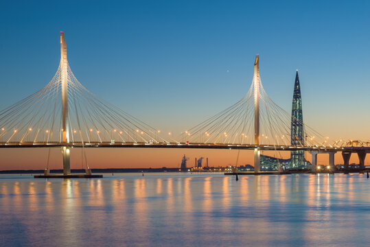 Cable-stayed bridge over the Petrovsky fairway in the May twilight, Saint Petersburg