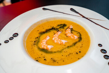 Salmorejo - traditional andalusian cold soup served with shrimps, Spain