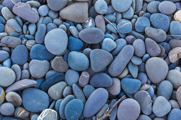 The texture of large river pebbles. Will match the background