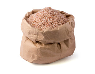 paper bag full of whole grain brown rice isolated in white background