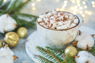 Obraz na płótnie Canvas Mug of hot chocolate with candy marshmallows. Winter beverage. Holiday concept, Selective focus