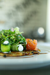 zucchini roll with cottage cheese cream and salmon