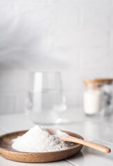 selective focus. food supplement collagen in the form of powder for dissolving in water. natural composition. benefits for the face and body