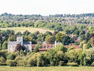 Fototapeta na wymiar View of The Hospital of St Cross and Almshouse of Noble Poverty Winchester Hampshire England from St Catherine's Hill