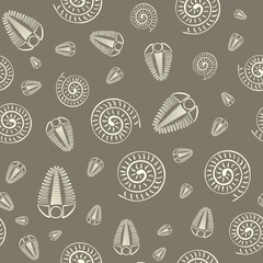 Ammonite trilobite vector seamless pattern background. Hand drawn spiral-form shell cephalopod and arthropod ribbed fossils. Brown off white backdrop.Extinct marine predators. Repeat for education © Gaianami  Design