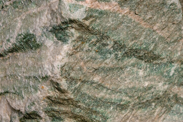 Landscape stone. Green granite. Selective focus. 
