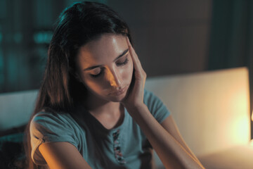 Depressed young woman suffering from insomnia