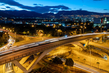 Fototapeta na wymiar Medellin, Antioquia, Colombia. June 2019: Aguacatala Bridge at night with long exposure.