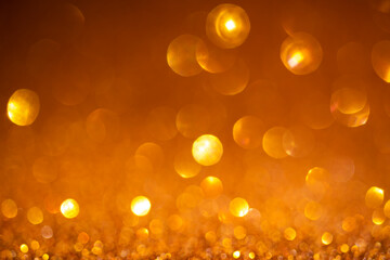 Orange bokeh background. Vintage glitter lights, glowing christmas effects backdrop photo