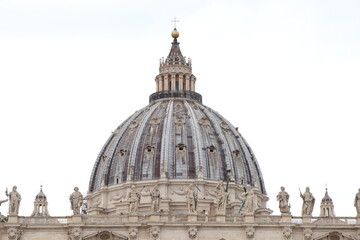 St. Peter's Basilica Dome with Statues in Rome, Italy