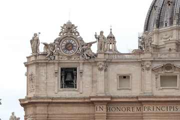 St. Peter's Basilica Facade Detail with Sculpted Clock in Rome, Italy