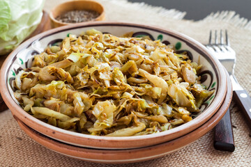 Fried white cabbage with caraway seeds and curry powder