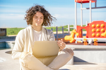 guy working remotely outdoor