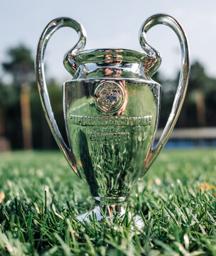 August 30, 2021 St. Petersburg, Russia. The UEFA Champions League Cup on the green turf of the football field.