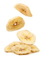 Dried banana slices fall on a heap on a white background. Isolated