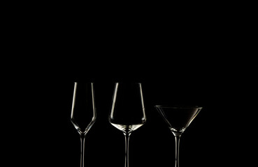 Sharp of wine cups and cocktail cup against black background