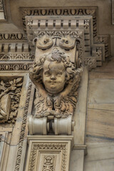 Architectural fragment of Milan Cathedral (Duomo di Milano, 1386), dedicated to St Mary of the Nativity (Santa Maria Nascente), with Gothic and Lombard Romanesque style. Milan, Italy.