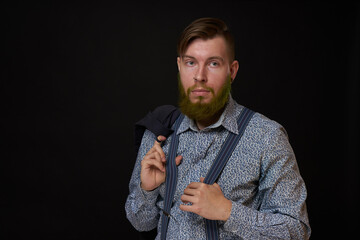 bearded man elegant style shirt dark background