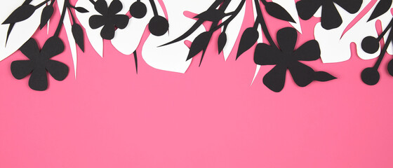 Bright pink banner with beautiful floral black and white paper cut art. Leaves and flowers corner frame. Top view, Flat lay, copy space