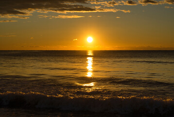 Fototapeta premium A peaceful sunrise on the beach of the Costa Azahar