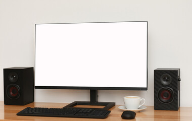 Blank screen on the desktop computer with cup of coffee, mock up
