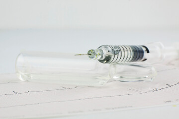 Medications and syringe a look at the world of addiction and drugs