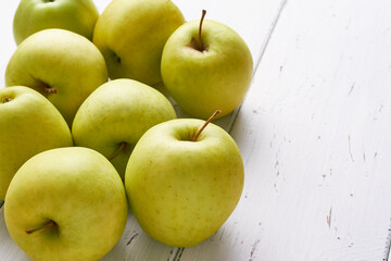 golden delicious apple on white background