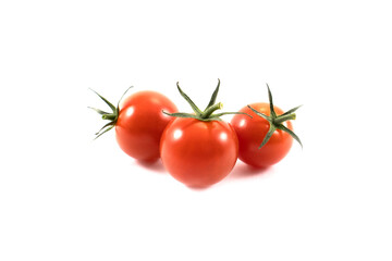 Photo of three red tomatoes on white background