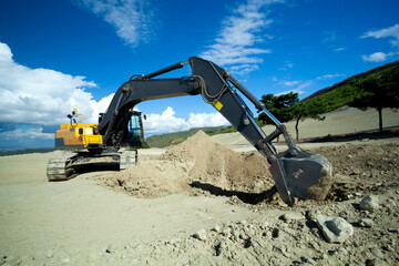Excavator is working in construction site 